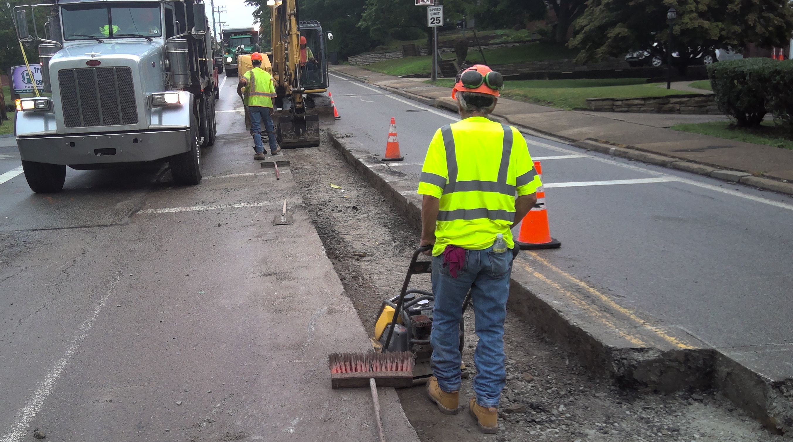 Utility workers installing a new gas line