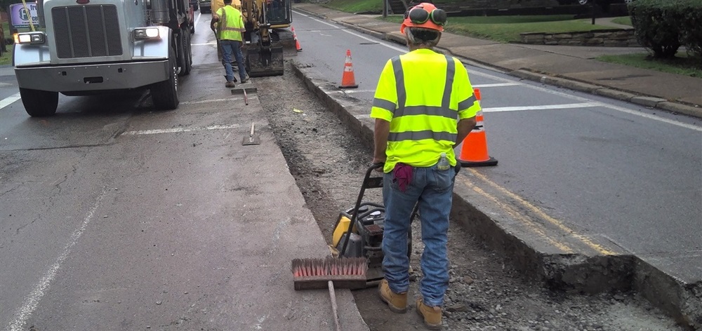 Utility workers installing a new gas line